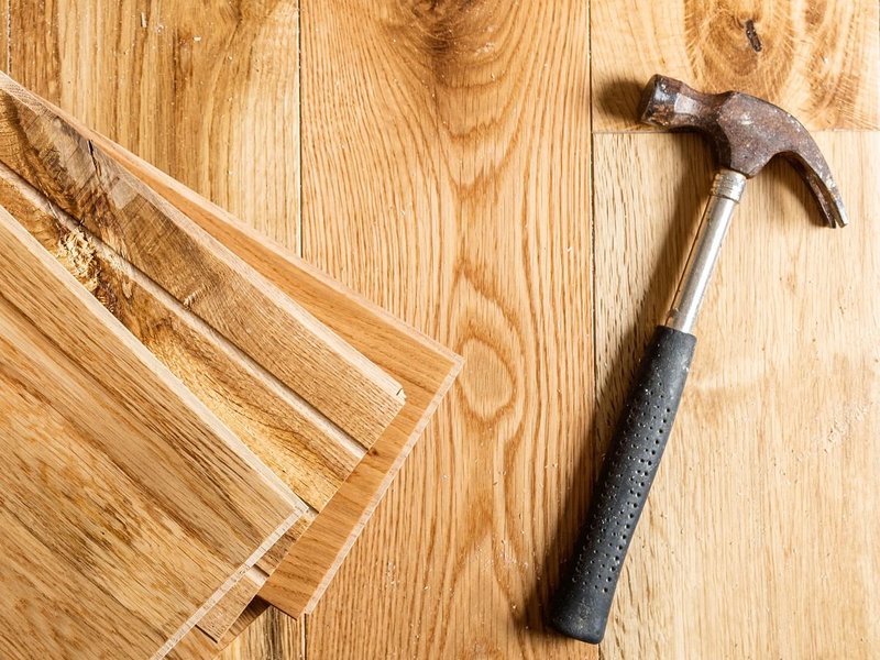 Hammer on hardwood planks - Hardwood flooring installation services from 180 Degree Floors in the Nashville, TN area