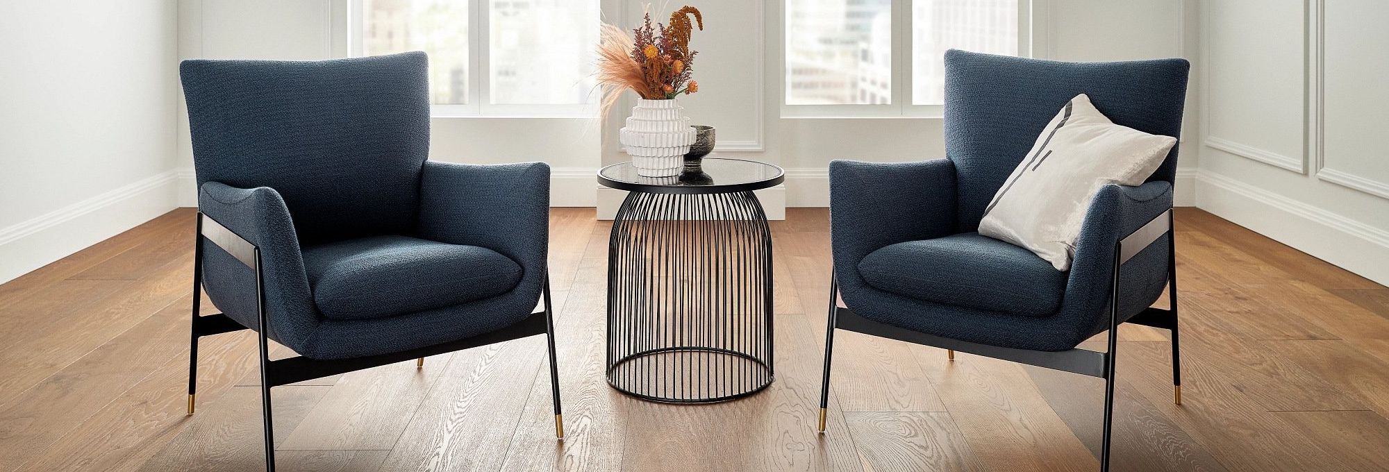 Two blue chairs in a room with hardwood flooring from 180 Degree Floors in the Nashville, TN area